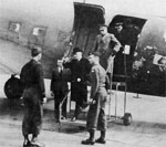 Brig General Ira P Swift,assistant Commanding General, decorating Pvt Leonard Opper of the 504th PIR with the DSC