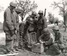 Members of the 307th AEB defuse a German Mine - May 1945